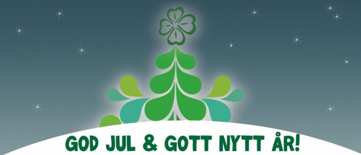 Bild på en grafiskt ritat julgran med centerlogga och texten God Jul och Gott Nytt År.